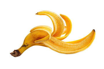 A vibrant yellow banana peel against a stark black background, showcasing its peeled form