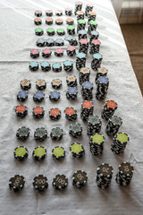 Casino chips on the table. Coins for board games.