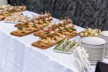 Food on the festive table. Cold appetizers for the banquet.