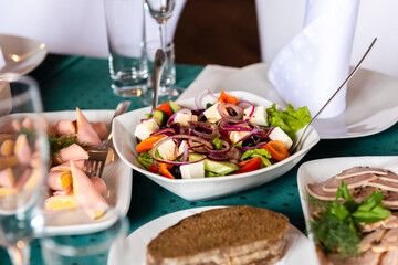 Food on the festive table. Cold appetizers for the banquet.