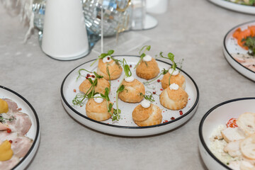 Food on the festive table. Cold appetizers for the banquet.
