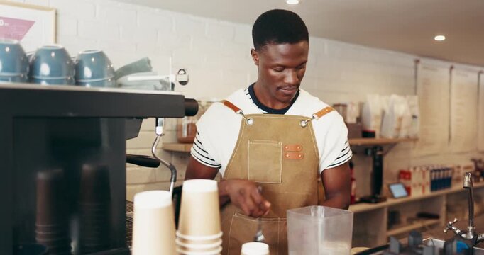 Black man, barista and machine for smoothie at cafe for healthy drink, customer order and diet seeds. Male person, blender and ingredients for protein shake, wellness benefits and hospitality service