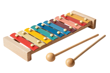 A colorful xylophone with mallets, isolated on a black background