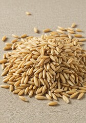 Heap of Oat Groats on Neutral Surface in Natural Light
