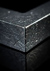 Close Up of Cracked Black Metal Surface with Textured Reflection