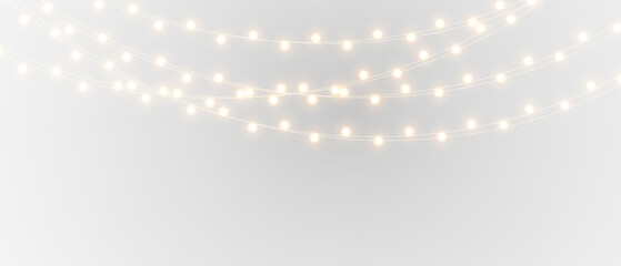 Warm Christmas garland lights isolated. Holiday glowing string illumination for greeting cards and cozy festive atmosphere.