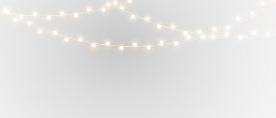 Warm Christmas garland lights isolated. Holiday glowing string illumination for greeting cards and cozy festive atmosphere.