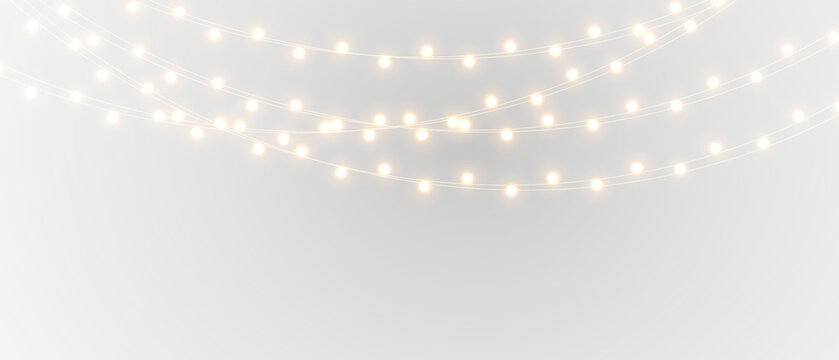 Warm Christmas garland lights isolated. Holiday glowing string illumination for greeting cards and cozy festive atmosphere.