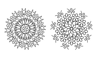 Two floral mandala designs in black and white for coloring books and relaxation