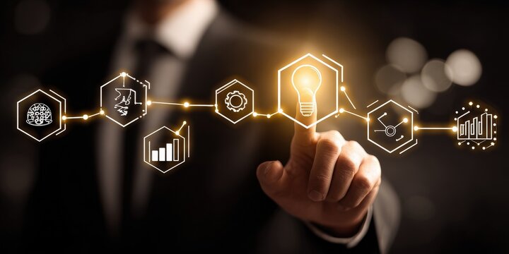Businessman's Hand Touching Illuminated Bulb Icon On Digital Interface Dark Background Conceptual Technology Visualization