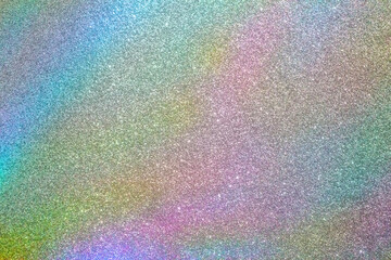 Abstract holographic rainbow foil iridescent glitter sparkle texture background