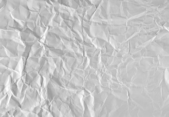 New blank white paper sheet, folded and wrinkled background and texture