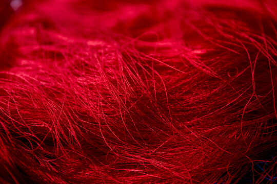 Red texture thread of silk background