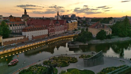 Evening Panorama of Wrocław – Aerial View with Illuminated Street Lamps