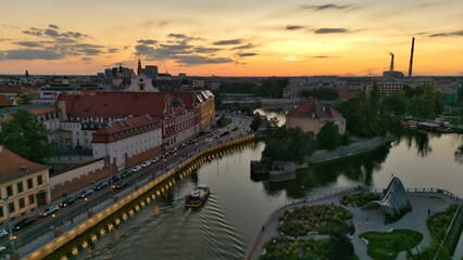 Evening Panorama of Wrocław – Aerial View with Illuminated Street Lamps
