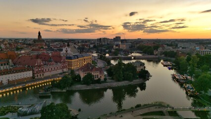 Evening Panorama of Wrocław – Aerial View with Illuminated Street Lamps