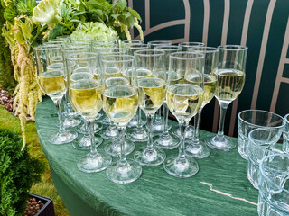 An Elegant and Beautiful Arrangement of Champagne Glasses Designed Perfectly for a Toasting Celebration, Ideal for Any Memorable Occasion and Festive Gathering, Filled with Excitement and Joy