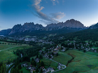 Cortina d' Ampezzo in Italian Alps, Winter Olympics in Italy, winter skiing resort in the Dolomites, Cima Tofana di Mezzo. Autumn morning mountain forest. Beautiful meadow in the Italian Alps . 