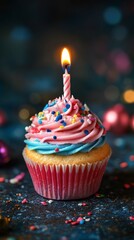 A delicious cupcake with pink and blue frosting and a burning candle on a dark background.
Perfect for food blogs, confectionery advertising, greeting cards, and holiday articles.
