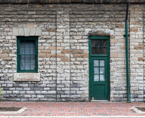 old brick wall with windows