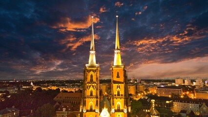 Evening Panorama of Wrocław – Aerial View of Ostrów Tumski with Illuminated Street Lamps