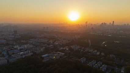 Fototapeta premium Aerial photography of the city in the sunset