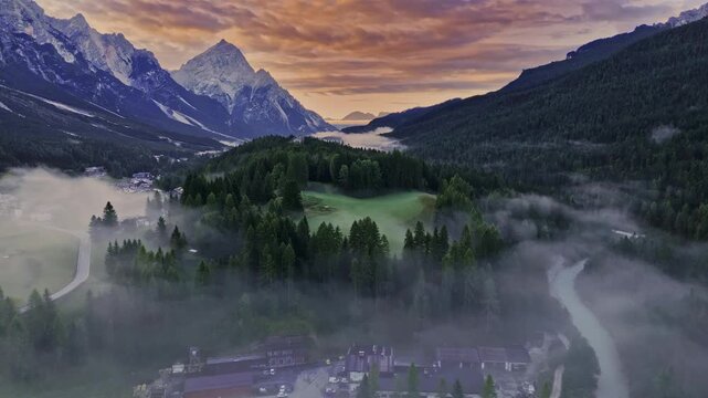 Cortina d' Ampezzo in Italian Alps, Winter Olympics in Italy, winter skiing resort in the Dolomites, Cima Tofana di Mezzo. Autumn morning mountain forest. Beautiful meadow in the Italian Alps . 