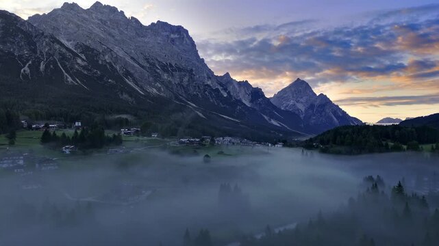 Cortina d' Ampezzo in Italian Alps, Winter Olympics in Italy, winter skiing resort in the Dolomites, Cima Tofana di Mezzo. Autumn morning mountain forest. Beautiful meadow in the Italian Alps . 