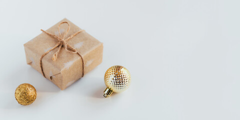 Christmas gift box and decorations on white background
