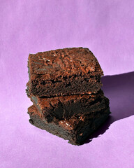 Fudgy Chocolate Brownies on Colorful Background &ndash; Sweet Dessert Food Photography