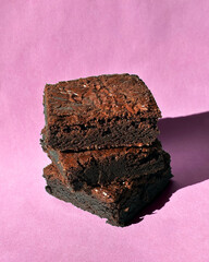 Fudgy Chocolate Brownies on Colorful Background &ndash; Sweet Dessert Food Photography