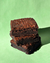 Fudgy Chocolate Brownies on Colorful Background &ndash; Sweet Dessert Food Photography