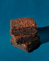 Fudgy Chocolate Brownies on Colorful Background &ndash; Sweet Dessert Food Photography