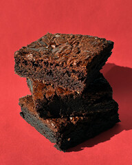 Fudgy Chocolate Brownies on Colorful Background &ndash; Sweet Dessert Food Photography