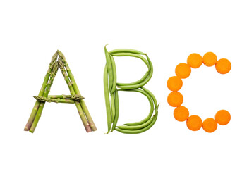 Obraz premium The letters a, b, and c formed from fresh vegetables, isolated on a transparent background