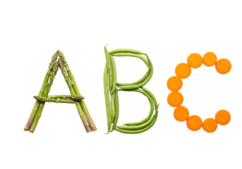 The letters a, b, and c formed from fresh vegetables, isolated on a transparent background