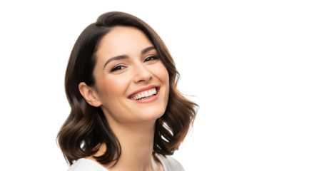 Smiling brunette teen woman's face closeup showing natural beauty and long hair in a studio fashion shot