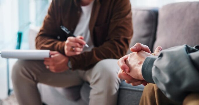 Therapy, writing and hands of people in office for consulting, counseling session and support. Psychology, mental health and therapist with patient with notes for diagnosis, listening and evaluation