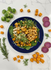 Seasoned Chickpeas, Tofu and Sprouts over Braised Spinach - Plant Based Vegan Seasonal Meal