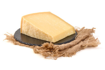 Parmesan Cheese on slate plate, isolated on white background