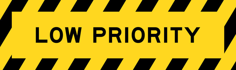 Yellow and black color with line striped label banner with word low priority