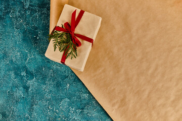 Beautifully wrapped holiday present with a festive touch, capturing the winter spirit perfectly.