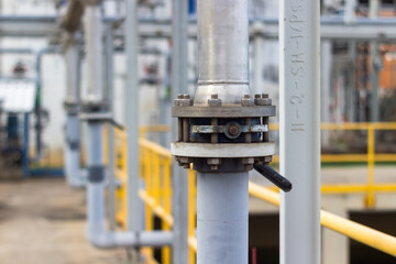 Pipes, valves, and flanges create industrial design, offering an engineering technology feel.