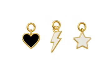 Golden charms, heart, lightning, star, isolated on a transparent background