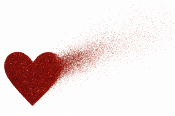 Red heart shape dissolving into a cloud of red glitter particles sparkle isolated on a transparent background