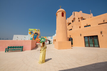 Colorful shopping villa's at old port mina park Qatar with selective focus.