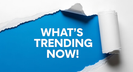 Torn paper revealing a bright blue background with the text whats trending now isolated on white background