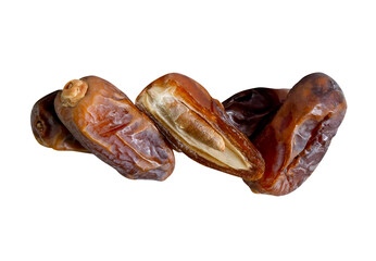 Ripe dried date palm fruits witth half in stack isolated on white background with clipping path. Concept of iftar food in Ramadan month for Muslims