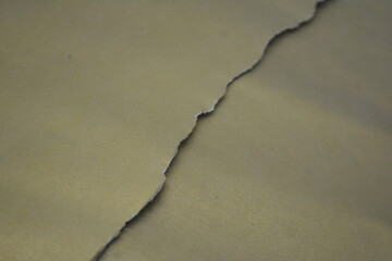gradient gold and brown torn paper background texture