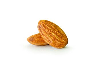 Brown almond nuts in stack isolated on white background with clipping path